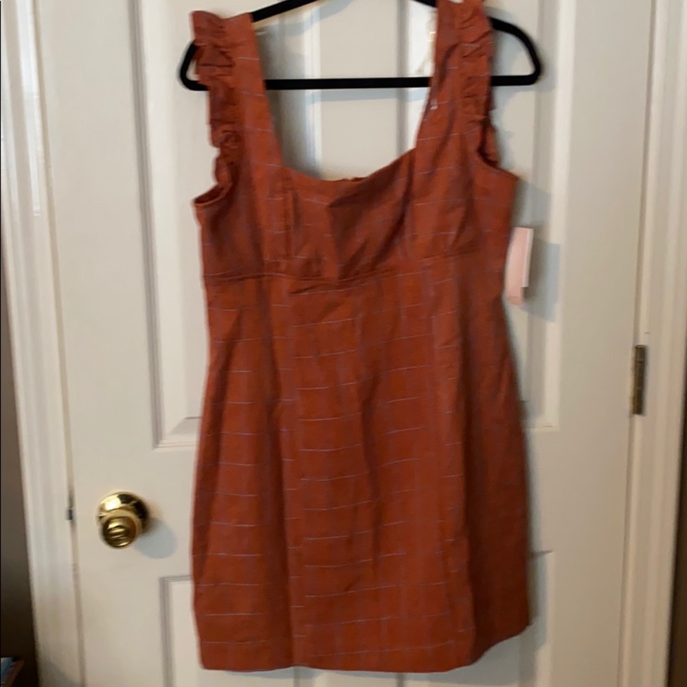 Cute orange sundress with light blue plaid pattern